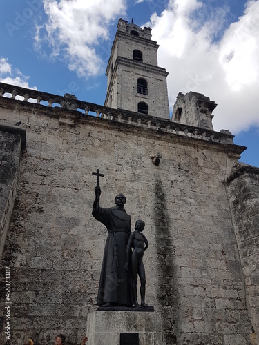 Old Havana Church and white stone buildings on a sunny day in Cuba.