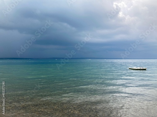 storm over lake with raft