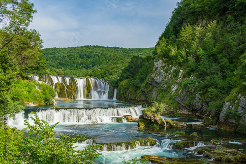 Strbacki buk waterfall is one of the most beautiful waterfalls in Bosnia and Herzegovina, which is situated on the Una river. photo