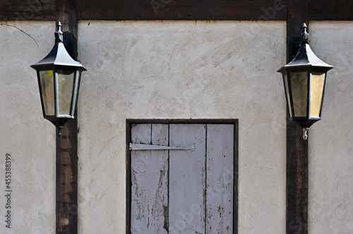 The wall of a store with an old kitchen door.