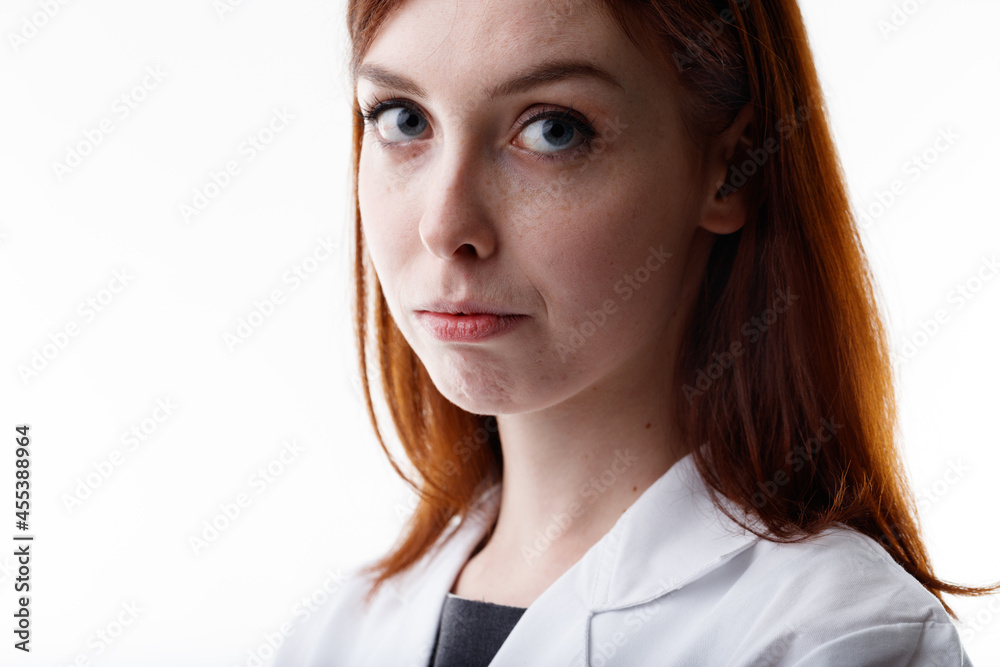 Serious young woman looking at the camera with big wide eyes Serious young woman looking at the camera with big wide eyes