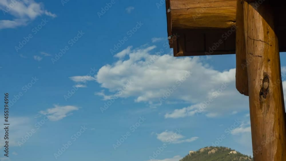Timelapse of clouds moving past the edge of a barn, sunny day. Beautufiul Timelapse of clouds moving past the edge of a barn, sunny day. Beautufiul