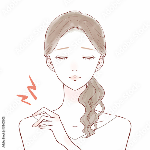 肩こりに悩まされる女性