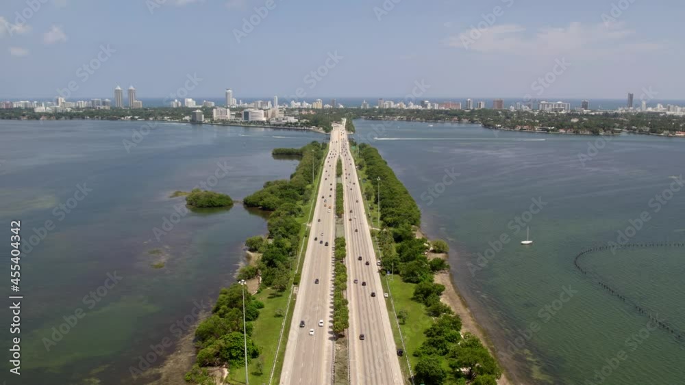Slow flight Bridge over water Miami Julia Tuttle Causeway 4k