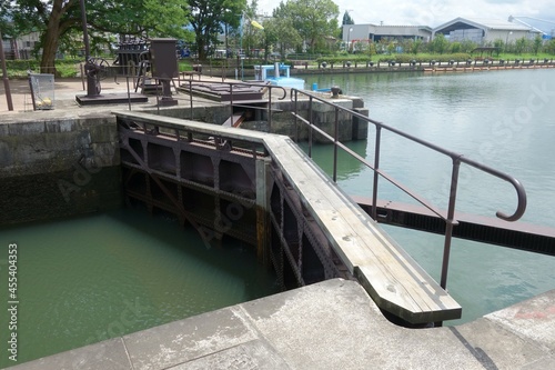                                            Closed lock door of the canal on a sunny day 