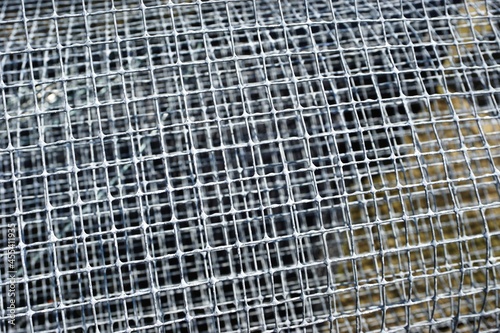 Hardware cloth metal wire grid abstract horizontal background texture