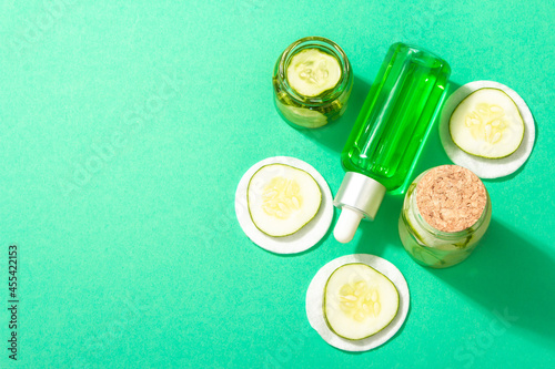 Homemade cucumber cosmetics. Detoxification skin vegetable masks. Natural face lotion, and tonic water