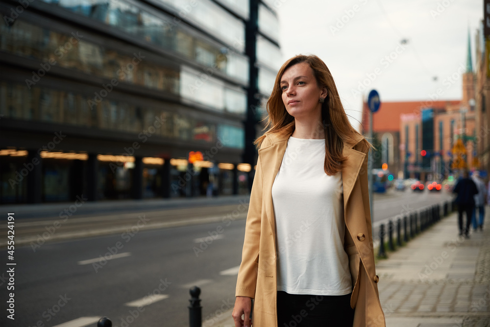 Portrait of woman at city street