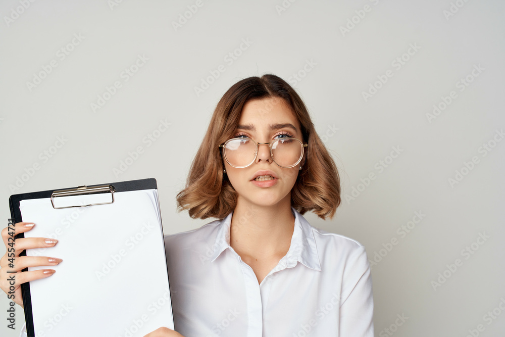 Business woman in white shirt documents manager office work Business woman in white shirt documents manager office work