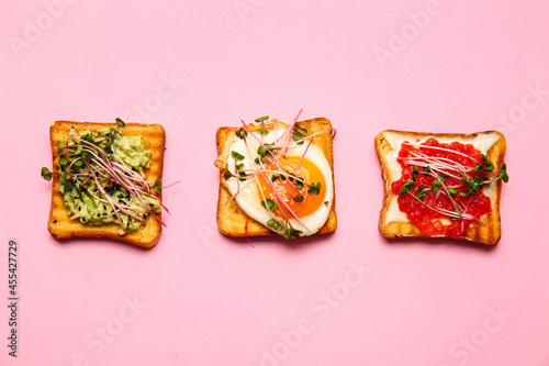 Different toasts with micro green on color background