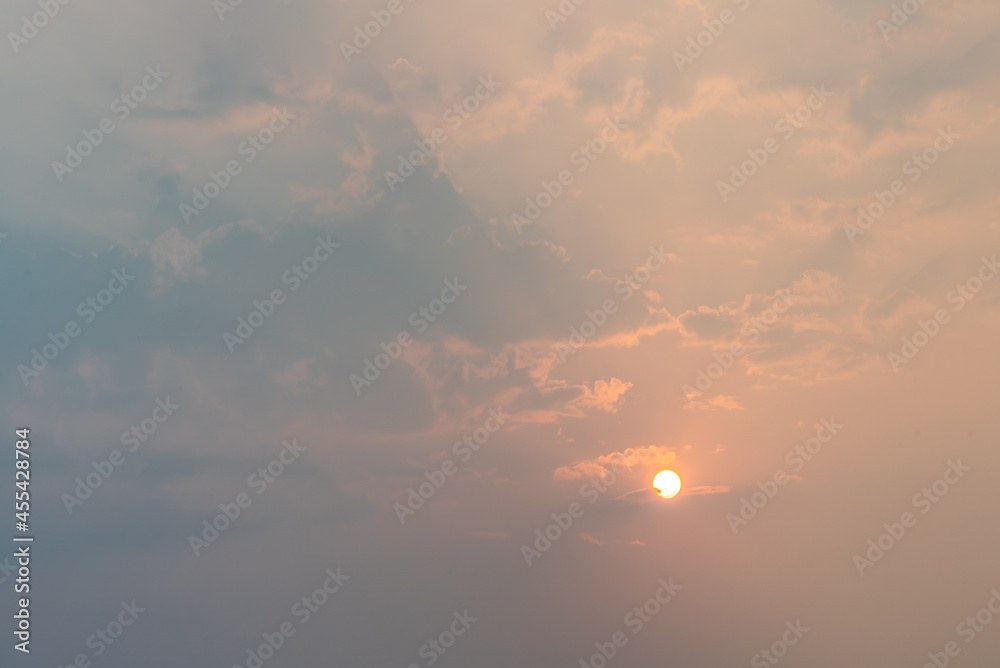 Beautiful sunrise sky above clouds with dramatic light, Beautiful blazing sunrise landscape, Horizon. Warm Colours, copy space.