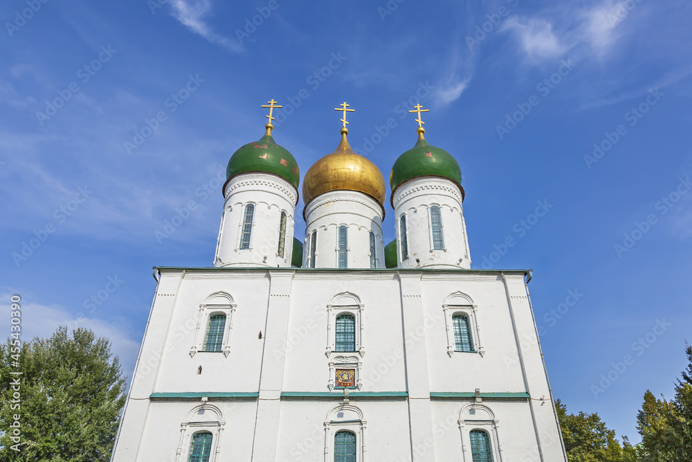 Exterior of the Orthodox Assumption Cathedral made of white stone. Founded in 1379. Kolomna, Russia