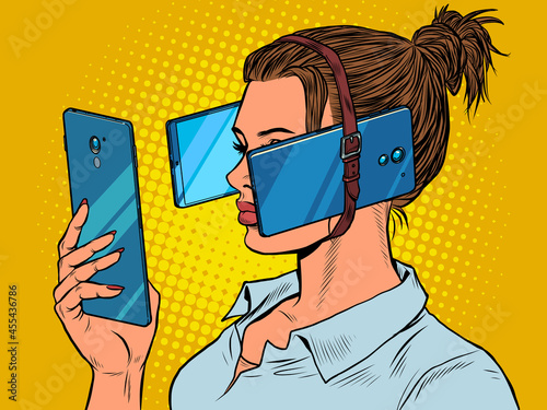 Woman in virtual reality, smartphones. dependence on electronic gadgets photo