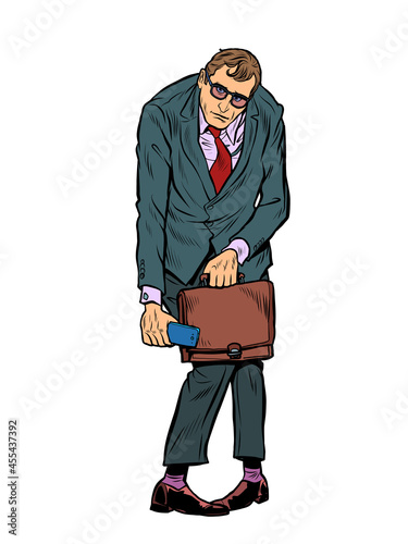 Sad businessman with a portfolio. Hard work, emotions and stress
