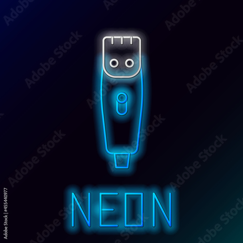 Glowing neon line Electrical hair clipper or shaver icon isolated on black background. Barbershop symbol. Colorful outline concept. Vector