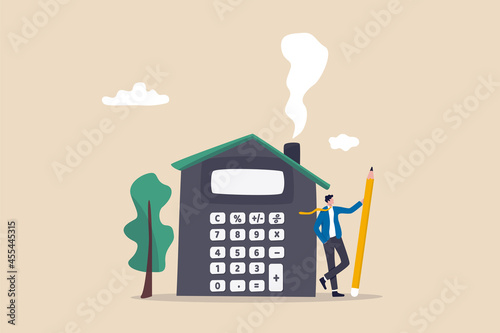 House mortgage calculation, residential budget, insurance or cost and expense, real estate investment or home decoration money concept, businessman agent or broker holding pencil with house calculator photo