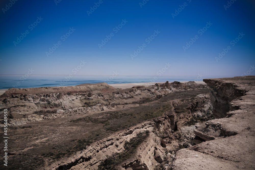 Panorama view to Aral sea from the rim of Plateau Ustyurt near Duana cape , Karakalpakstan, Uzbekistan