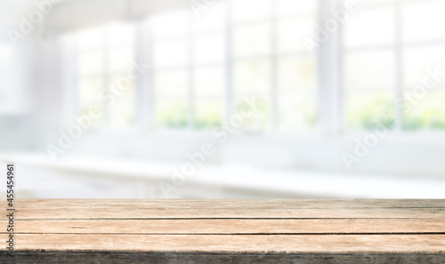 blurred light window background with table