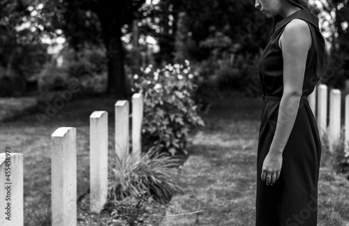 Young widow at the grave photo