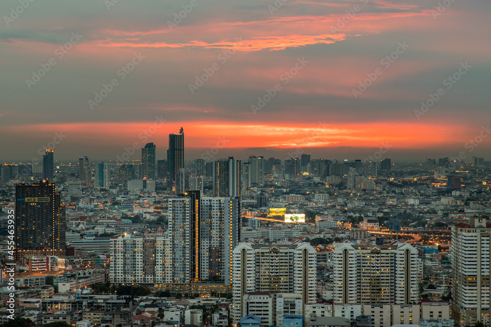 Fototapeta premium Bangkok, thailand - May 11, 2020 : Sky view of Bangkok with skyscrapers in the business district in Bangkok in the evening beautiful twilight give the city a modern style. Selective focus.