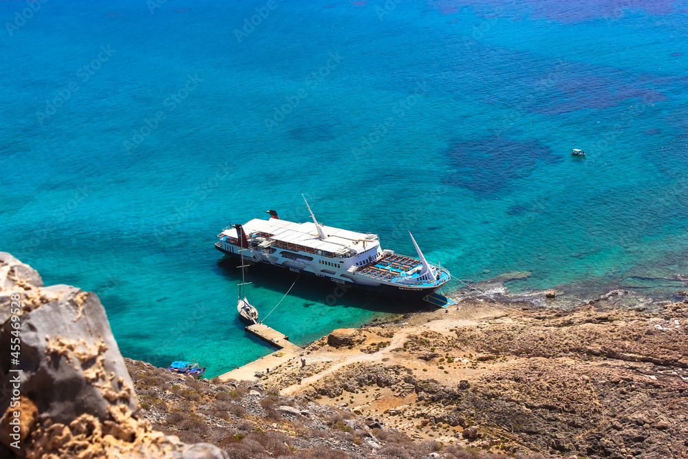 Balos Island Crete, Greece. May 1, 2015. Sea voyage on a sightseeing touristic ship. Amazing view from the mountain on blue water of Mediterranean Sea. Natural landscape. Gramvousa lagoon scenic view