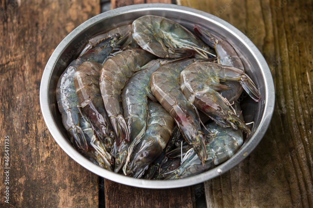 fresh raw shrimps in a bowl fresh raw shrimps in a bowl