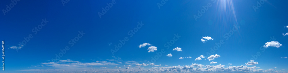 Panorama Blue sky and white clouds. Bfluffy cloud in the blue sky background Panorama Blue sky and white clouds. Bfluffy cloud in the blue sky background
