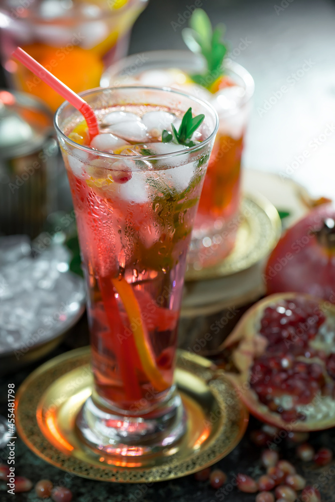 Fruit cocktail, in a glass with natural healthy fruits on a table with kitchen accessories. Fruit cocktail, in a glass with natural healthy fruits on a table with kitchen accessories.