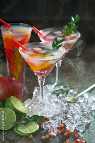 Refreshing summer alcoholic cocktail with crushed ice and citrus fruits