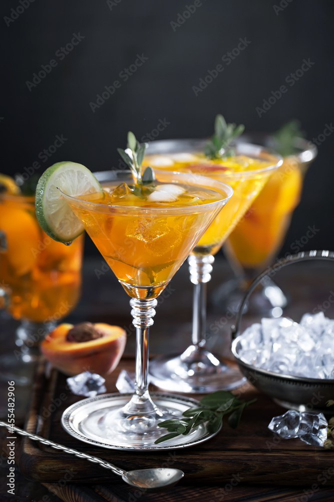Cocktail in a glass with fruit on an old background. Cocktail in a glass with fruit on an old background.
