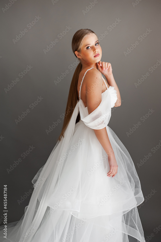 Beautiful bride. Wedding hairstyle and make up. Fashion wedding dress Beautiful bride. Wedding hairstyle and make up. Fashion wedding dress