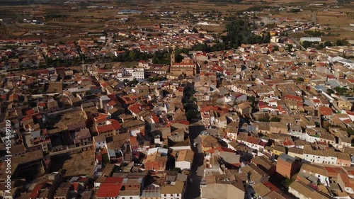 Forward aerial view of Casasimarro church at sunrise
