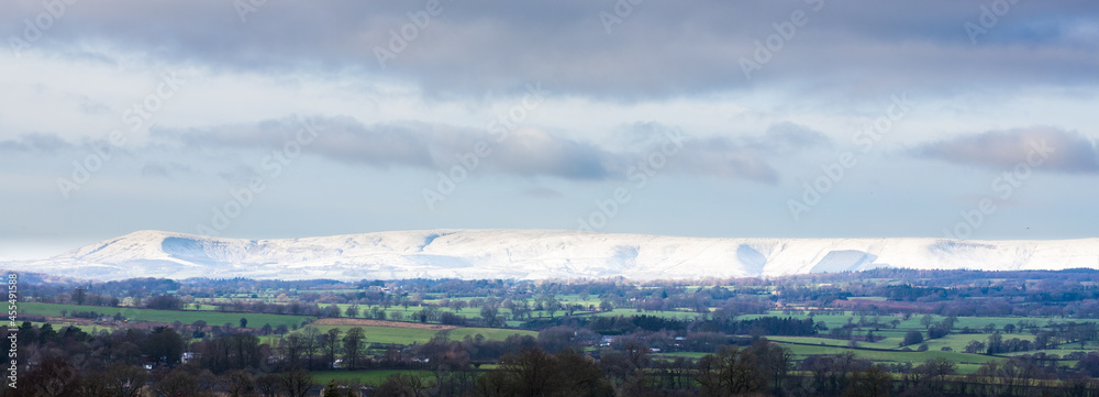 Snowy mountain covered in fresh winter snow. Panoram of snowy hills in the ribble valley, lancashire