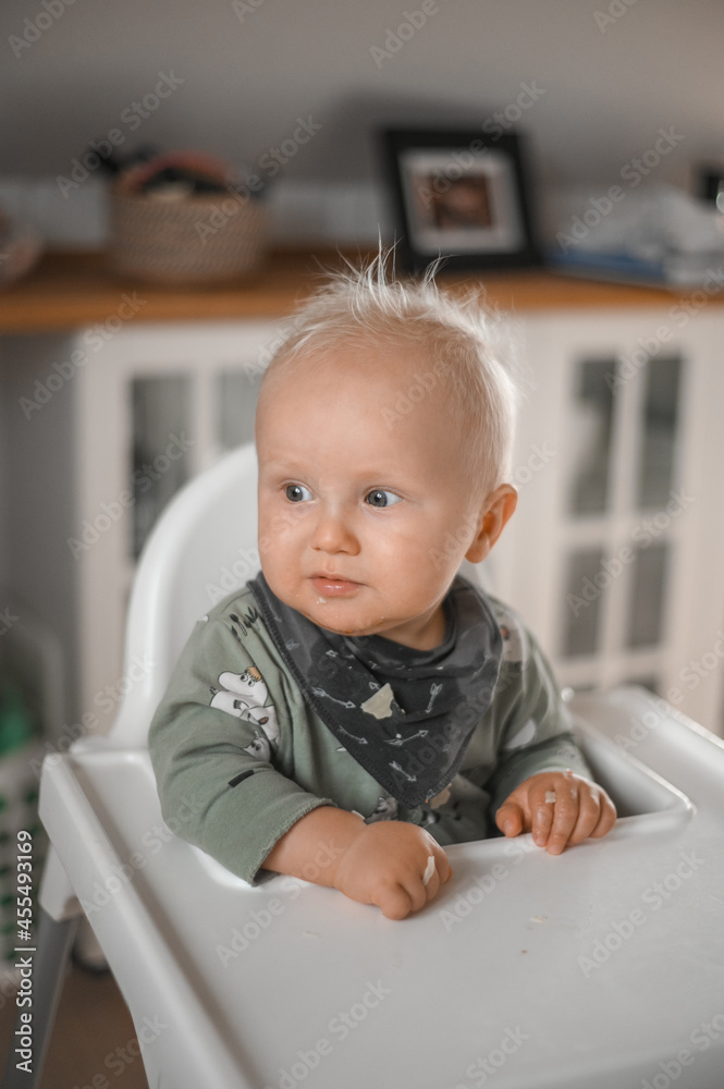 close up portrait of cute boy smiling eating baby food. Happy childhood close up portrait of cute boy smiling eating baby food. Happy childhood
