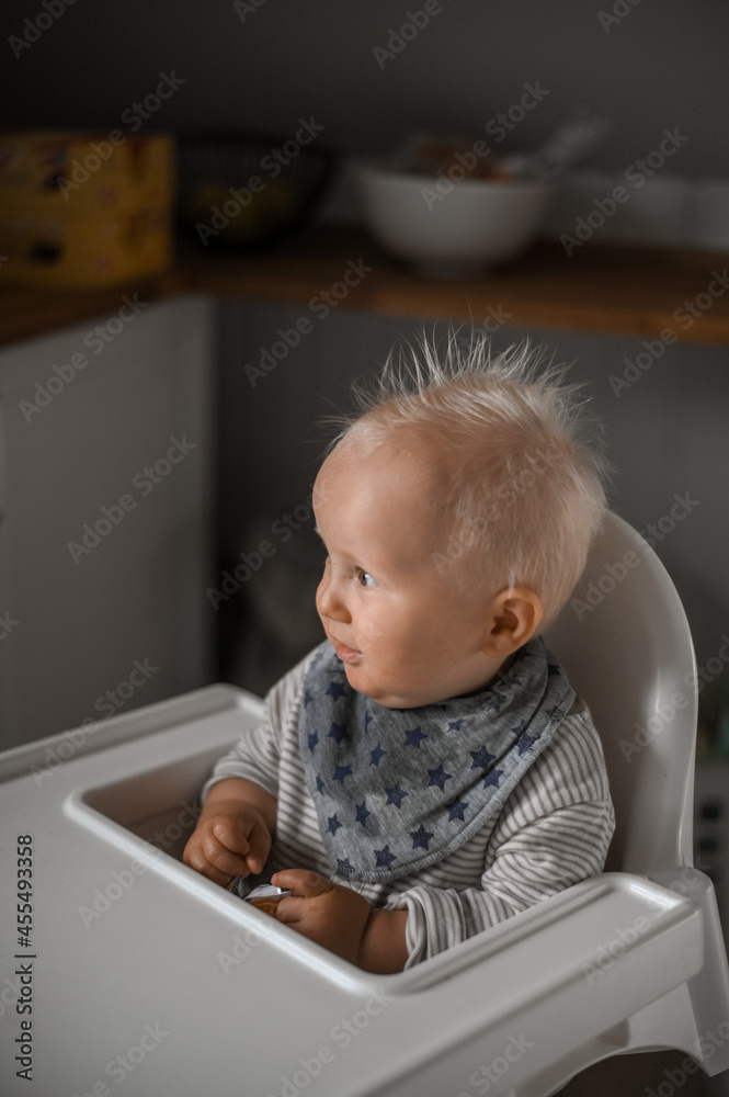 close up portrait of cute boy smiling eating baby food. Happy childhood close up portrait of cute boy smiling eating baby food. Happy childhood