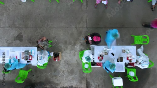 Top view people receiving vaccinations at Vaccination center against Covid-19 hyper-lapse, health and healthcare services during coronavirus covid 19 pandemic