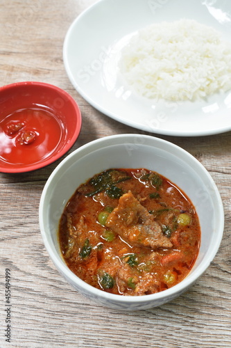 beef meat curry with eggplant in coconut milk or Panang Thai food on bowl with rice