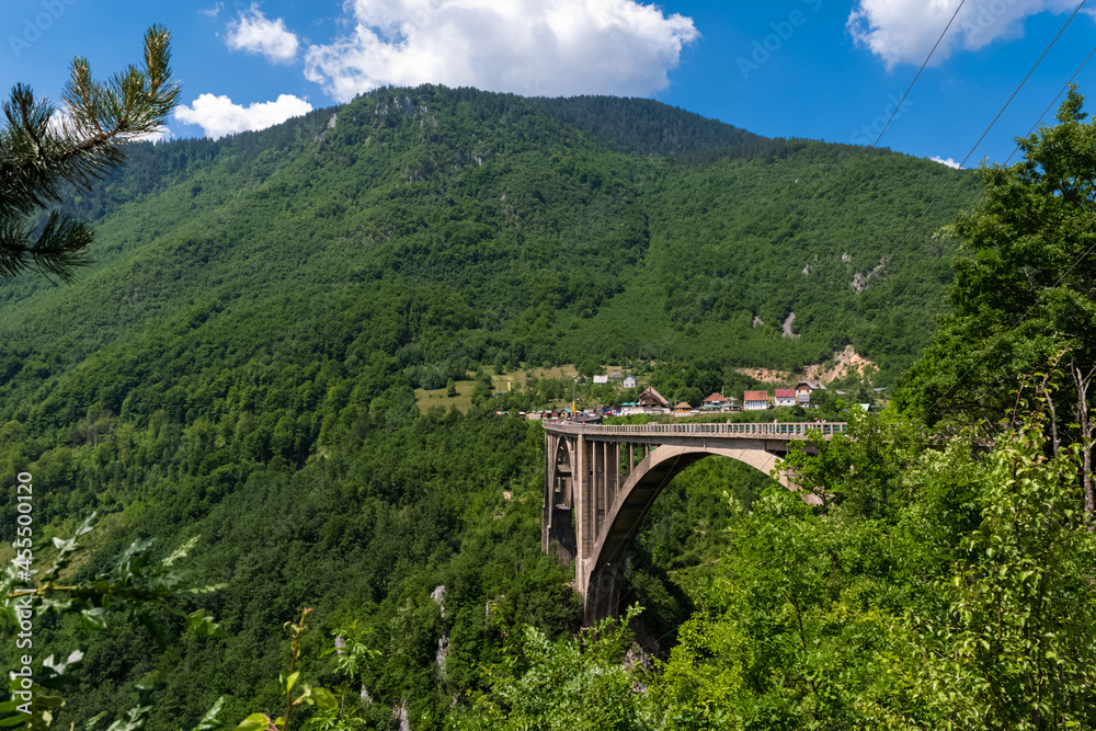 Concrete arch Durdevica Tara Bridge over Tara Canyon River in northern Montenegro. Concrete arch Durdevica Tara Bridge over Tara Canyon River in northern Montenegro.