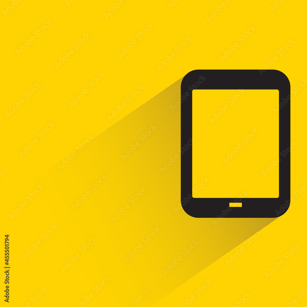 mobile phone with shadow on yellow background mobile phone with shadow on yellow background