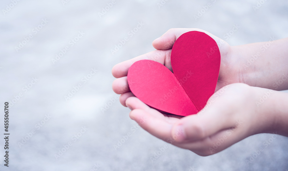 Children's hands holding love and charity concept illustration Children's hands holding love and charity concept illustration