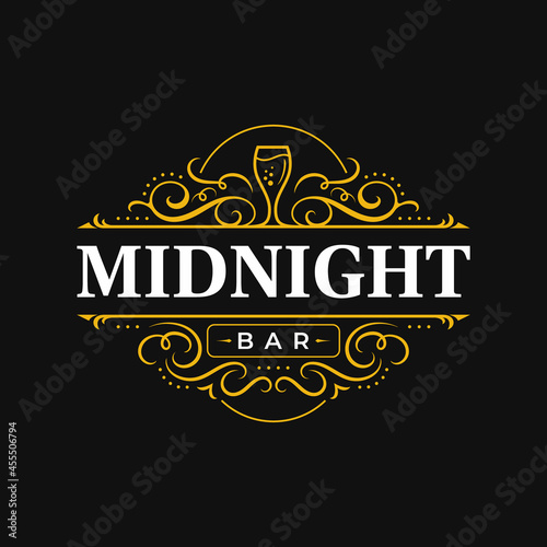 Vintage luxury ornamental decorative flourish ornament logo with wine glass. Suitable for bar, restaurant, pub, tavern, whiskey, cocktail, alcohol, beer, brewery, wine, shop signage.