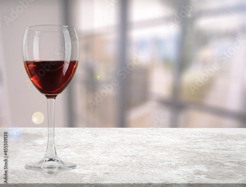 Red wine in an elegant glass on the desk