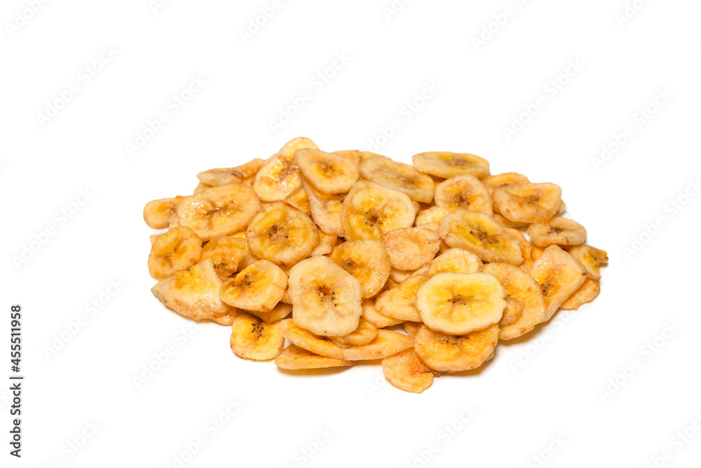 Banana chips isolated on a white background. Dehydrated banana. Banana chips isolated on a white background. Dehydrated banana.