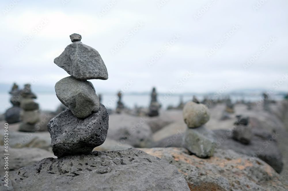 Balance - stacked stones at the coast of Reykjavik, Iceland Balance - stacked stones at the coast of Reykjavik, Iceland