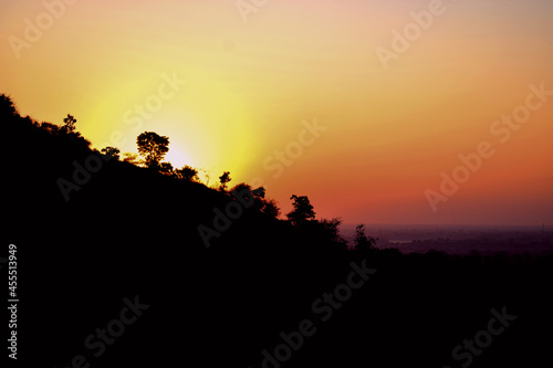 silhouettes of of mountain descend