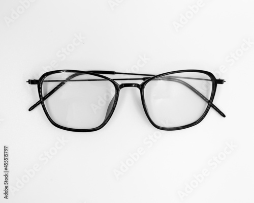 black glasses on a white background. simple and classic glasses for daily fashion style. elegant frame model for woman.