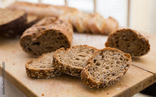 fresh loaf of bread on wooden board