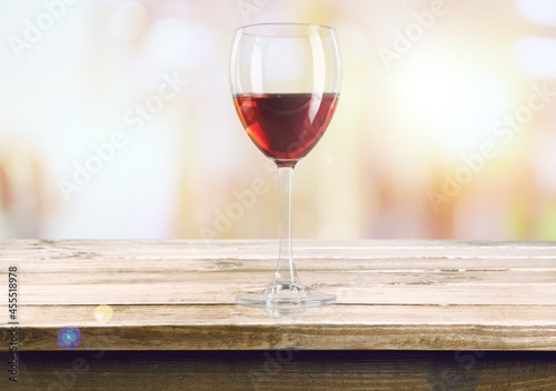 Red wine in an elegant glass on the desk