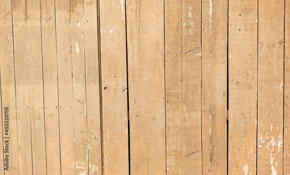 Obraz premium Wooden panel weathered and with rust as a backdrop.