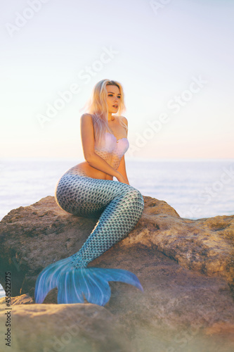 Blonde in a mermaid costume  photo